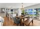 This open-concept kitchen and dining area features a scenic view, perfect for Gathering meals and gatherings at 138 Lakefront Dr, Mooresville, NC 28117