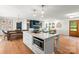 Spacious kitchen features a large center island with barstool seating, perfect for casual dining and socializing at 138 Lakefront Dr, Mooresville, NC 28117