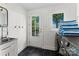 Clean laundry room with a sink and new appliances at 138 Lakefront Dr, Mooresville, NC 28117