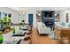 Open floor plan showcasing kitchen, dining, and living spaces with modern décor and lake views at 138 Lakefront Dr, Mooresville, NC 28117