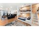 Spacious living area featuring custom bunk beds and comfortable lounge furniture at 138 Lakefront Dr, Mooresville, NC 28117