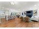 Open-concept floor plan with kitchen, living room, and dining area filled with natural light at 138 Lakefront Dr, Mooresville, NC 28117