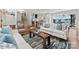 Open living space filled with lots of natural light, modern furniture and hardwood floors at 138 Lakefront Dr, Mooresville, NC 28117