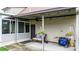 Cozy back patio with a comfortable seating area and stylish lighting at 139 Pleasant Garden Dr, Taylorsville, NC 28681