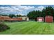 This large backyard has plenty of space for to play. Multiple storage buildings offer plenty of storage at 139 Pleasant Garden Dr, Taylorsville, NC 28681