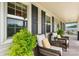 Relaxing front porch with comfortable seating, perfect for enjoying the outdoors at 139 Pleasant Garden Dr, Taylorsville, NC 28681