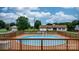 Backyard pool featuring a wooden deck, perfect for outdoor enjoyment at 139 Pleasant Garden Dr, Taylorsville, NC 28681