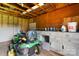 Interior view of a shed containing lawnmower and tools at 139 Pleasant Garden Dr, Taylorsville, NC 28681