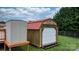 This shed features a roll up door to make it easier to store bigger items, like lawn equipment and tools at 139 Pleasant Garden Dr, Taylorsville, NC 28681