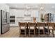 Modern kitchen with stainless steel appliances, a center island, and pendant lighting at 1431 Hubert Graham Way, Tega Cay, SC 29708