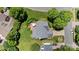 Bird's eye view of a single-Gathering home with a landscaped backyard, patio, and mature trees at 16018 Hollingbourne Rd, Huntersville, NC 28078