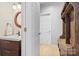 Bathroom with a vanity and mirror at 16018 Hollingbourne Rd, Huntersville, NC 28078