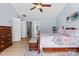 The main bedroom boasts lots of light, hardwood floors and neutral wall colors at 16018 Hollingbourne Rd, Huntersville, NC 28078