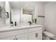 Bathroom with double sinks, quartz countertop, matte black faucets and vanity hardware at 16018 River Tree Ln, Charlotte, NC 28278