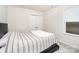 Cozy bedroom with a striped bedspread and plush throw blanket at 16018 River Tree Ln, Charlotte, NC 28278