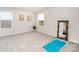 Bright bonus room features neutral carpet, natural light, and flexible space at 16018 River Tree Ln, Charlotte, NC 28278
