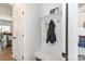 Mud room area with built-in storage and hanging hooks provides organization at 16018 River Tree Ln, Charlotte, NC 28278