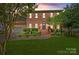 Charming brick two-story home featuring a well-manicured lawn and inviting front entrance at 16028 Cranleigh Dr, Huntersville, NC 28078