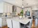 Modern kitchen featuring stainless steel appliances, granite countertops, custom cabinets, and eat-in island at 16308 Woolwine Rd, Charlotte, NC 28278