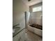 A bathroom features a shower/tub combo and single sink vanity with granite countertop at 1987 Robert Rufty Ln, Catawba, NC 28609