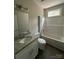 Bright bathroom features a granite vanity, white cabinets, and a shower-tub combination at 1987 Robert Rufty Ln, Catawba, NC 28609