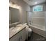 Bathroom featuring a granite vanity, grey walls and a bathtub with shower at 1987 Robert Rufty Ln, Catawba, NC 28609