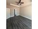 Bedroom features wood-look flooring, neutral walls, and white trim at 1987 Robert Rufty Ln, Catawba, NC 28609