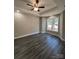 This bedroom features a trey ceiling, ceiling fan, neutral walls and luxury vinyl plank flooring at 1987 Robert Rufty Ln, Catawba, NC 28609