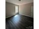 New bedroom featuring vinyl flooring and a window at 1987 Robert Rufty Ln, Catawba, NC 28609