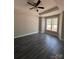 Spacious bedroom with ceiling fan and large window at 1987 Robert Rufty Ln, Catawba, NC 28609