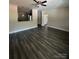 Modern living room showcasing hardwood floors and a seamless connection to the kitchen at 1987 Robert Rufty Ln, Catawba, NC 28609