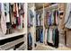 Spacious walk-in closet offers ample storage with built-in shelving and organized hanging space at 2024 Stonewyck Ave, Kannapolis, NC 28081