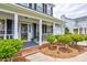Inviting front porch welcomes you with brick steps and lovely landscaping at 2024 Stonewyck Ave, Kannapolis, NC 28081
