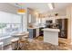 Updated kitchen features stainless steel appliances and a cozy breakfast nook at 2024 Stonewyck Ave, Kannapolis, NC 28081