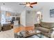 Open-concept living room with hardwood floors seamlessly connecting to the kitchen at 2024 Stonewyck Ave, Kannapolis, NC 28081