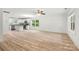 Bright and open living room featuring modern flooring and an abundance of natural light at 210 N Correll St, Landis, NC 28025