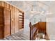 Large, finished attic space with high ceilings, built-in shelves, and abundant natural light at 217 S Highland St, Gastonia, NC 28052