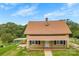 Charming home with a covered porch and a detached carport, nestled on a neatly maintained lot at 217 S Highland St, Gastonia, NC 28052