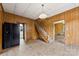 An open floor plan view showcasing a kitchen, staircase, and doorways at 217 S Highland St, Gastonia, NC 28052