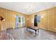 Bright living room showcasing laminate floors, vintage lighting, and natural light at 217 S Highland St, Gastonia, NC 28052