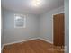 Clean bedroom with neutral paint, and hardwood floors at 2212 10Th Ne Ave, Hickory, NC 28601