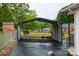 Open carport structure, offering sheltered parking space and practical backyard accessibility at 2212 10Th Ne Ave, Hickory, NC 28601