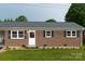 Traditional brick home with new landscaping, offering a cozy and inviting curb appeal at 2212 10Th Ne Ave, Hickory, NC 28601