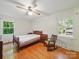 Bedroom featuring hardwood floors, bed, and windows at 2216 Griffith Rd, Monroe, NC 28112