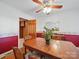 Classic dining room featuring a wooden table, chairs, and red accent wall at 2216 Griffith Rd, Monroe, NC 28112