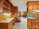Inviting living area with brick fireplace, wood-paneled walls, and built-in desk at 2216 Griffith Rd, Monroe, NC 28112