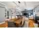 Elegant dining room with seating for six, view into the living room, and hardwood flooring at 2217 Yadkin Ave, Charlotte, NC 28205