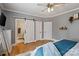 Charming main bedroom featuring a barn door to the ensuite bathroom at 2217 Yadkin Ave, Charlotte, NC 28205