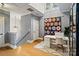 Bright office space with hardwood floors, vaulted ceilings, and a decorative quilt at 2217 Yadkin Ave, Charlotte, NC 28205