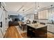 Modern open concept with view from island, combining kitchen, dining area, and a living room at 2217 Yadkin Ave, Charlotte, NC 28205